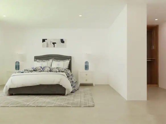 Ruime slaapkamer met wit interieur en moderne decoratie.