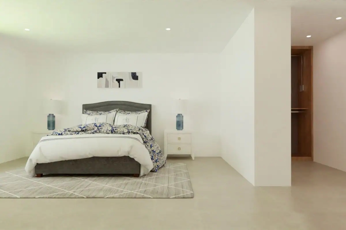 Ruime slaapkamer met wit interieur en moderne decoratie.