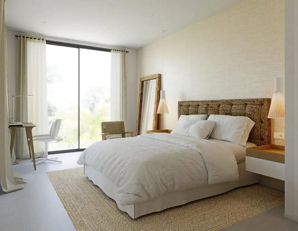 Ruime slaapkamer met groot raam en natuurlijk licht, modern interieur en comfortabele bed.
