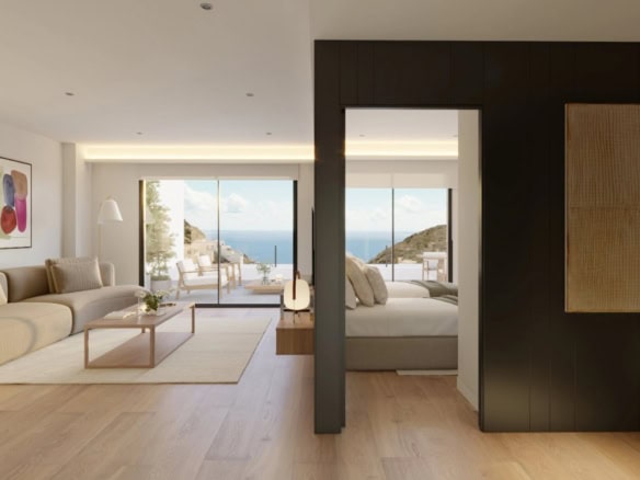 Luxe woonkamer met grote ramen en uitzicht op de zee en de omgeving in Cumbre del Sol.