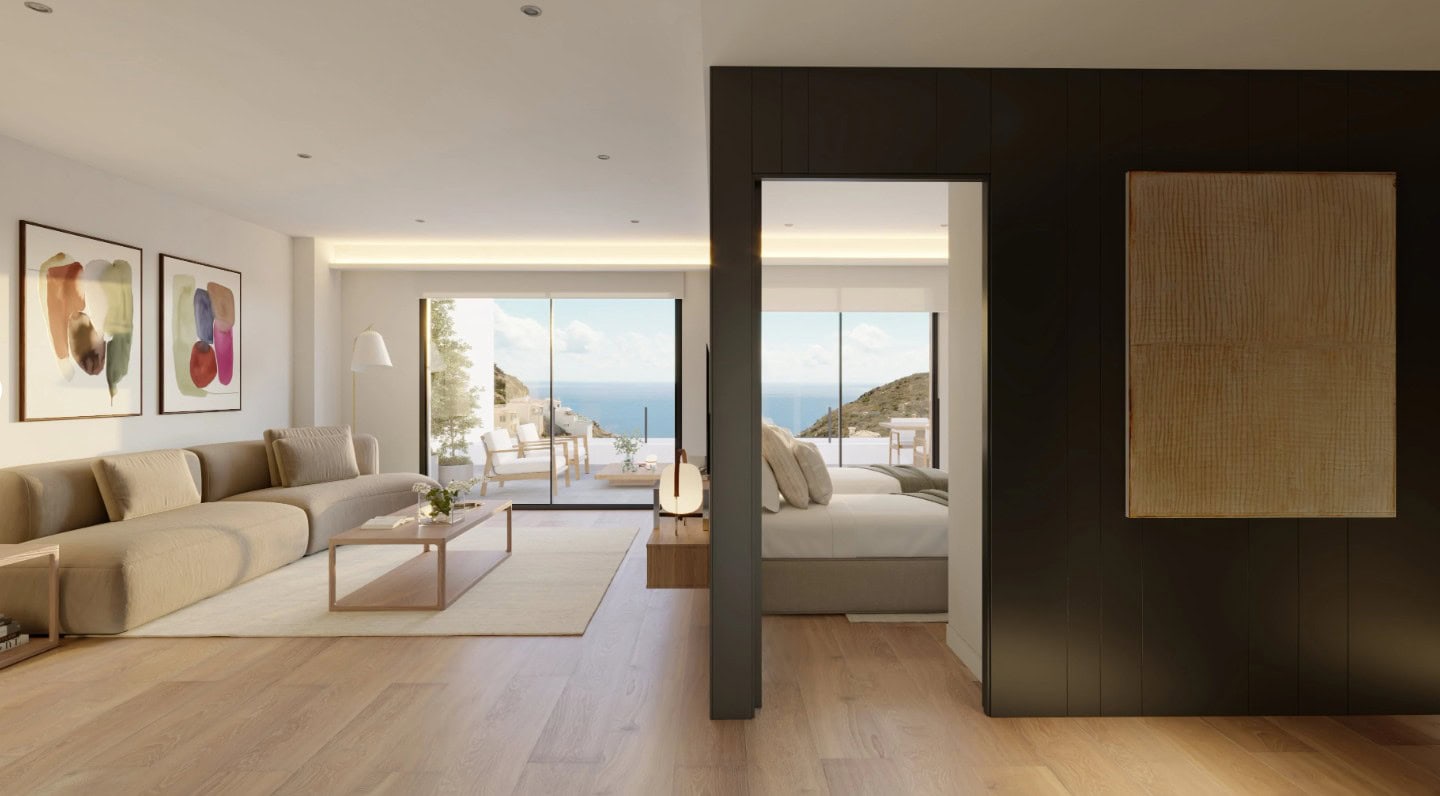 Luxe woonkamer met grote ramen en uitzicht op de zee en de omgeving in Cumbre del Sol.