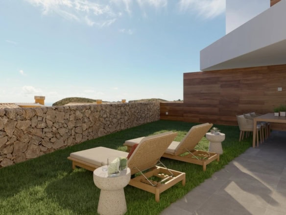 Uitzicht op tuin en zee, comfortabele ligbedden en terras met eethoek in Cumbre del Sol.