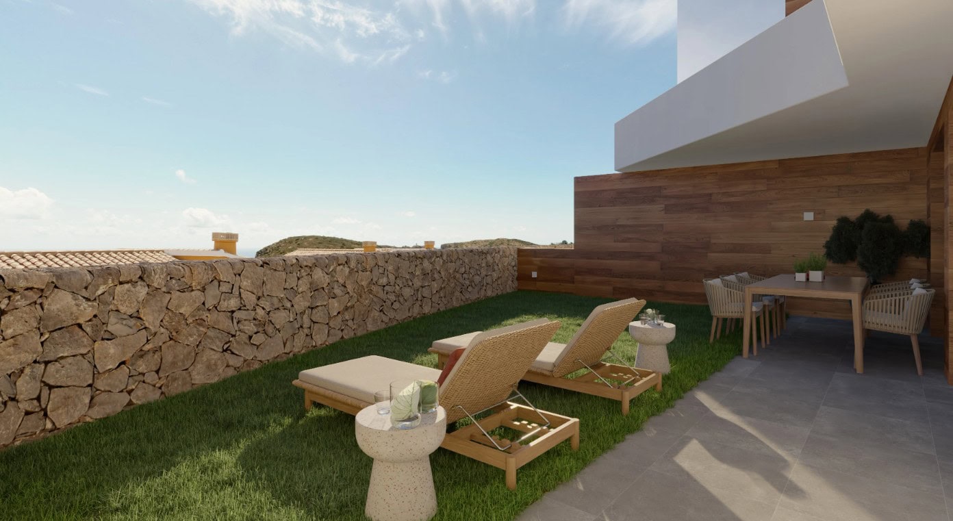 Uitzicht op tuin en zee, comfortabele ligbedden en terras met eethoek in Cumbre del Sol.