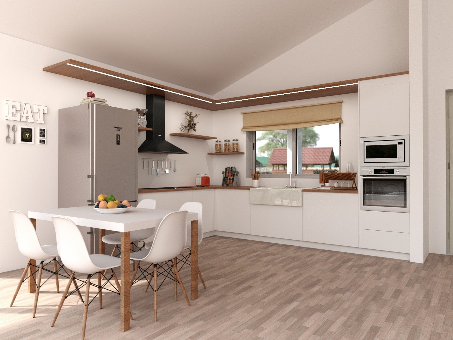 Modern keuken in nieuwe villa in Campo de San Juan, Moratalla. Moderne keuken met wit keukenblok, oven, koelkast en eettafel.